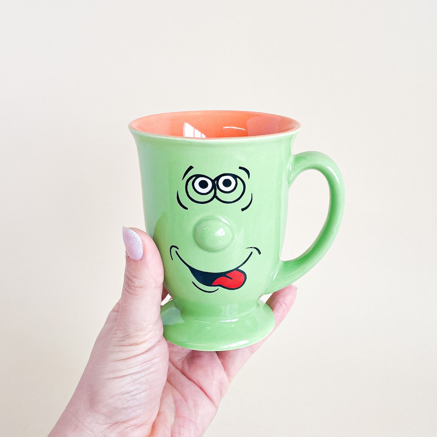 Green face mug