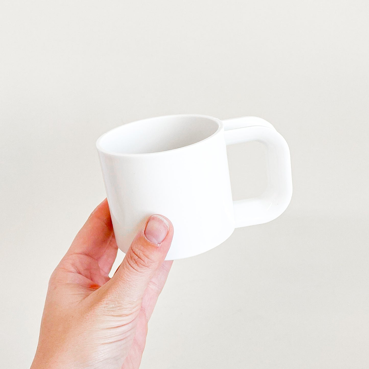 White plastic mugs trio