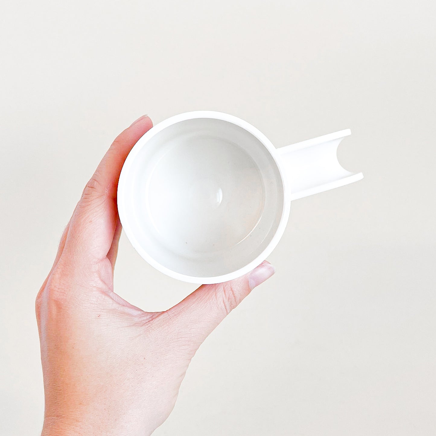 White plastic mugs trio