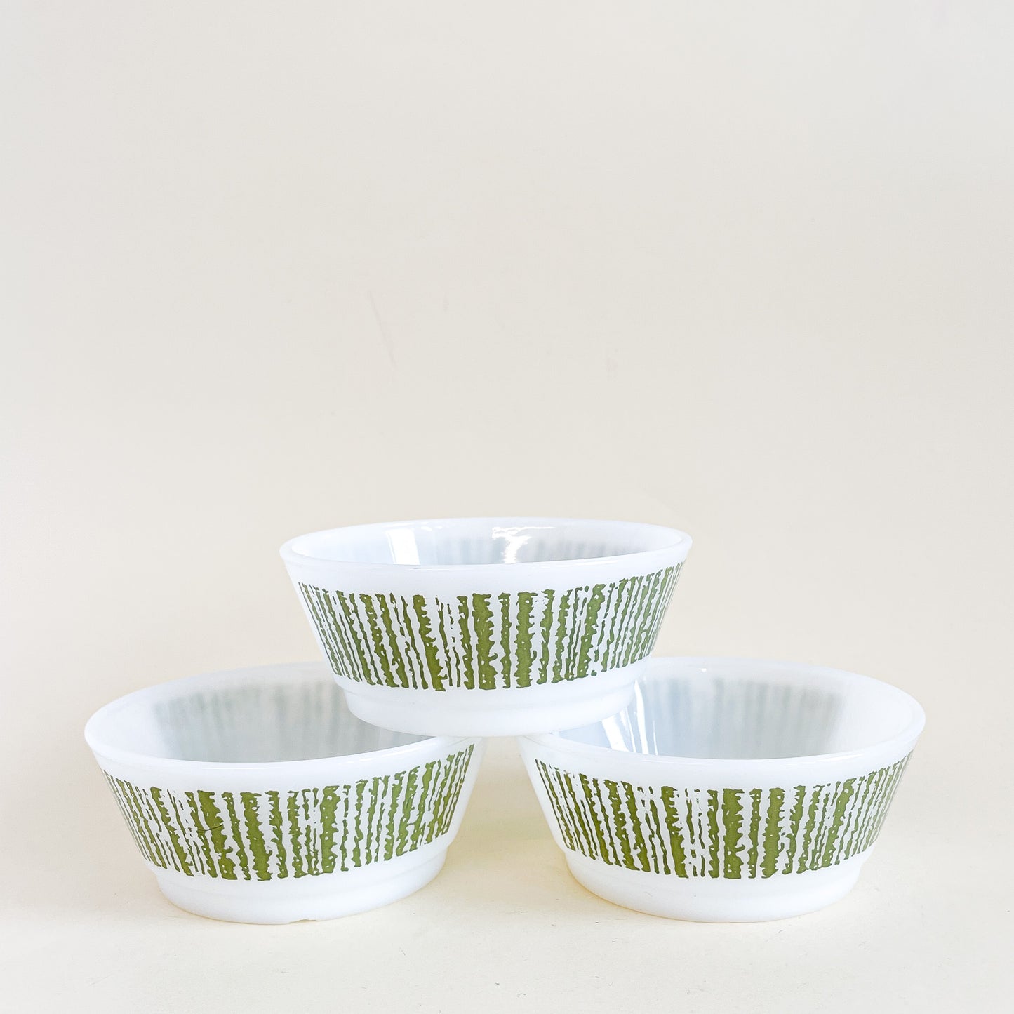 Trio of white and green Fire-King bowls
