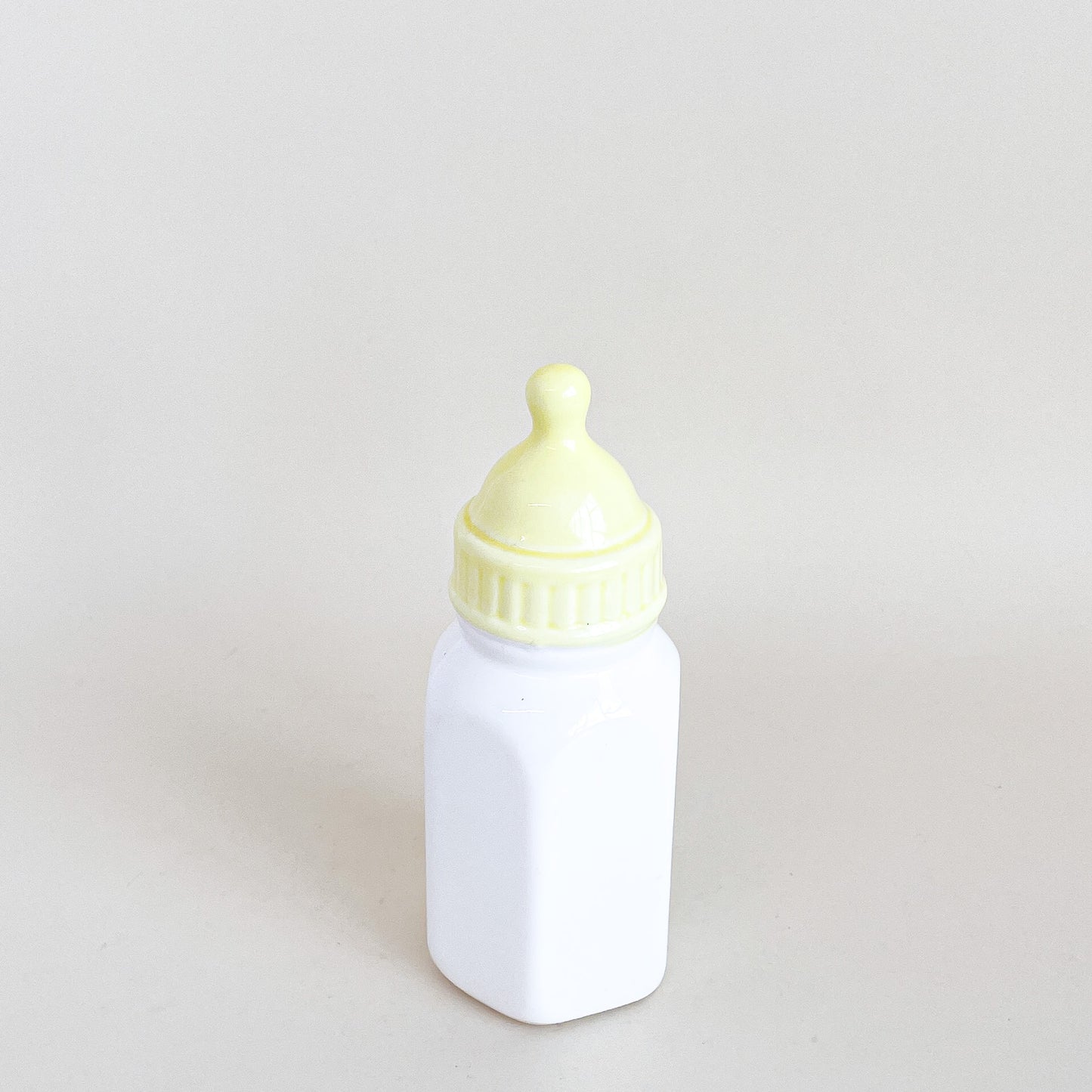 Ceramic baby bottle piggy bank