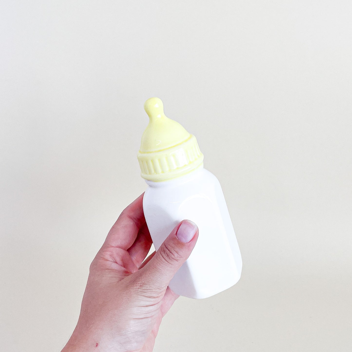 Ceramic baby bottle piggy bank