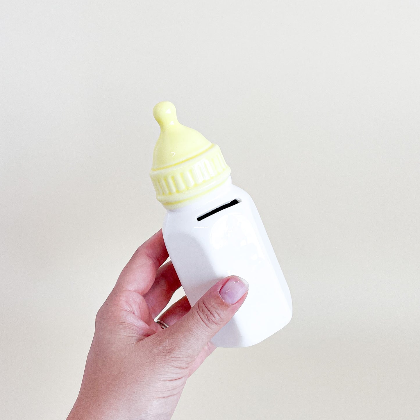 Ceramic baby bottle piggy bank