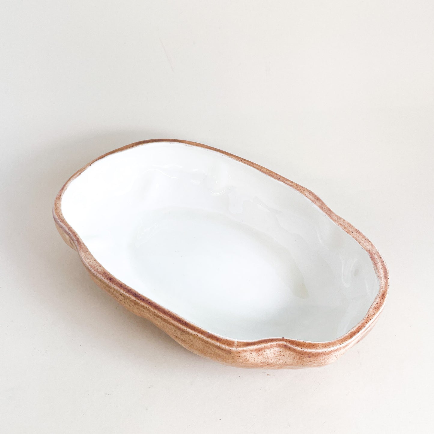 Glossy ceramic potato dish