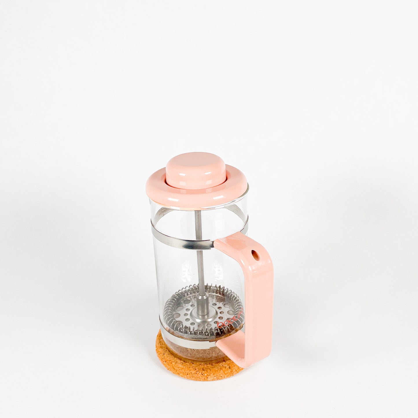Small pink Bodum french press coffee maker