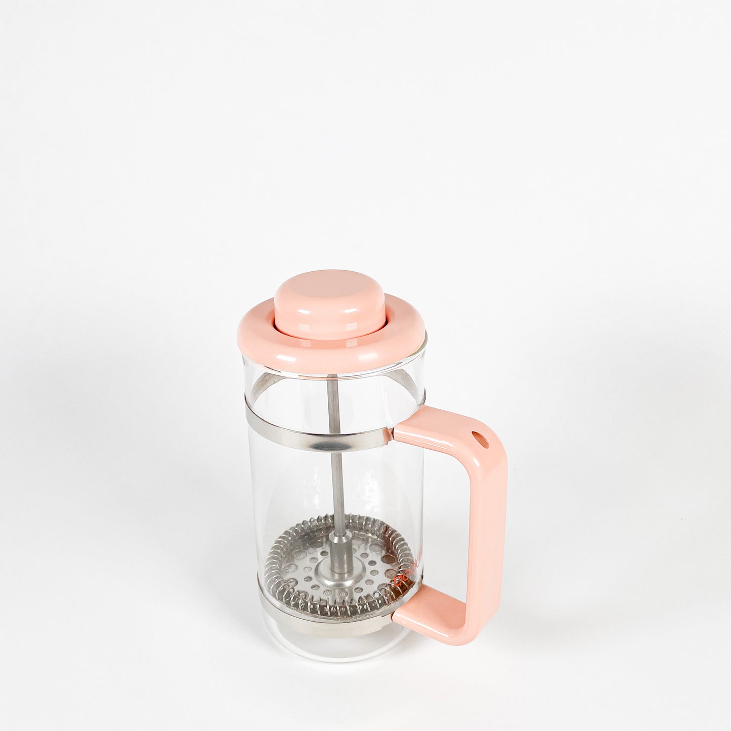 Small pink Bodum french press coffee maker