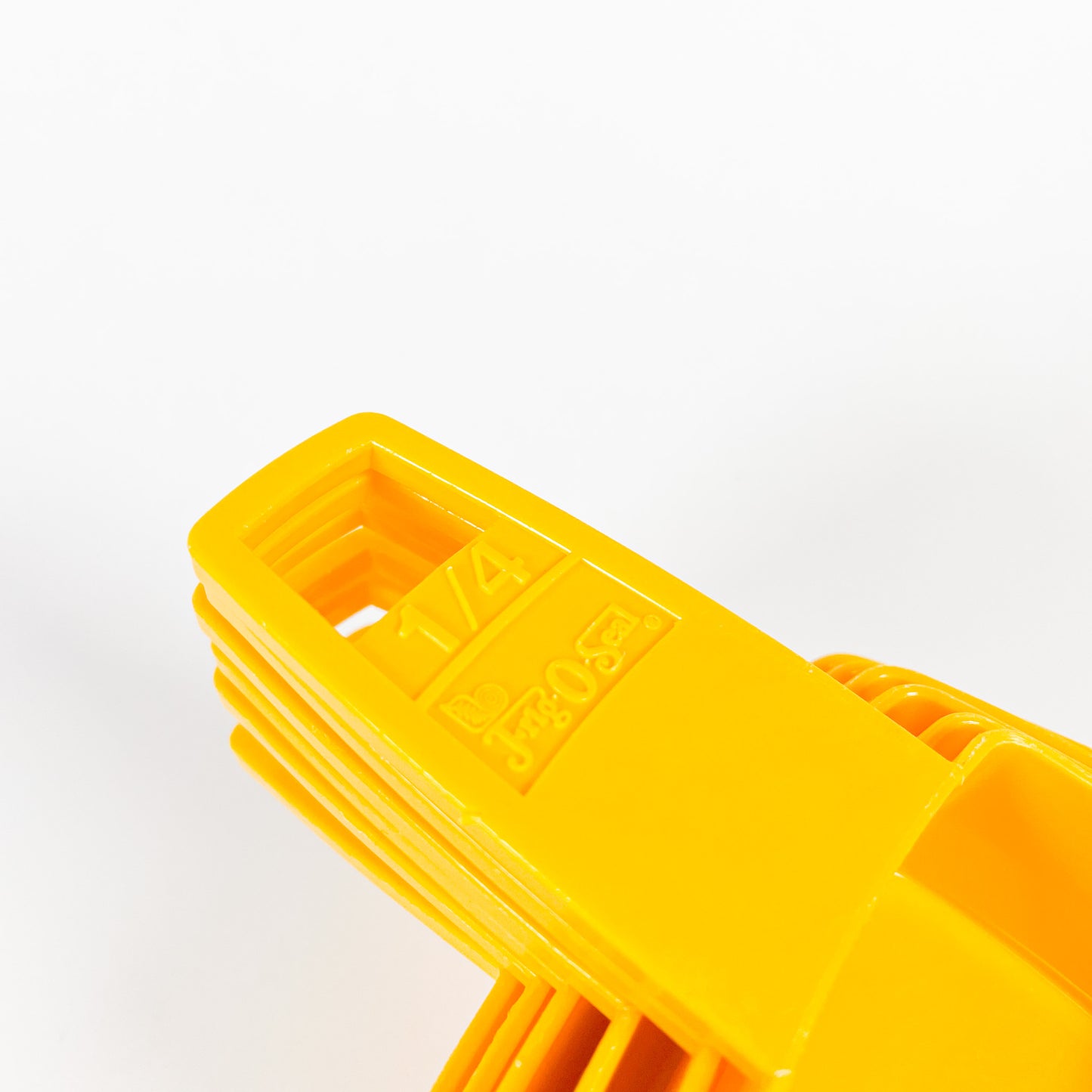Yellow Frig-O-Seal measuring cups