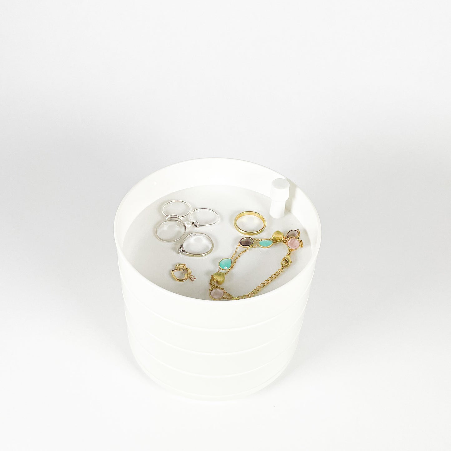 White swivel storage
