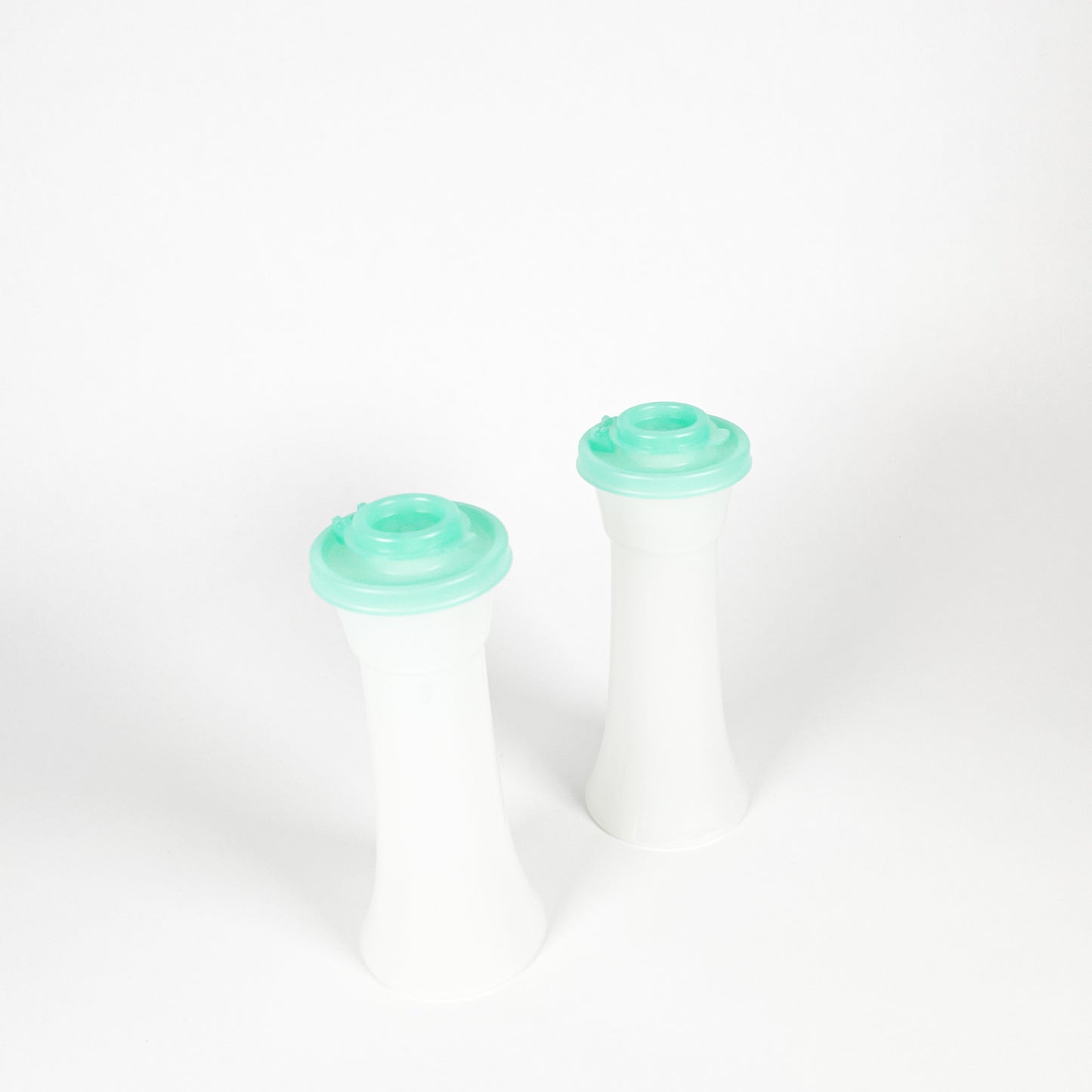 Tupperware turquoise salt and pepper shaker duo