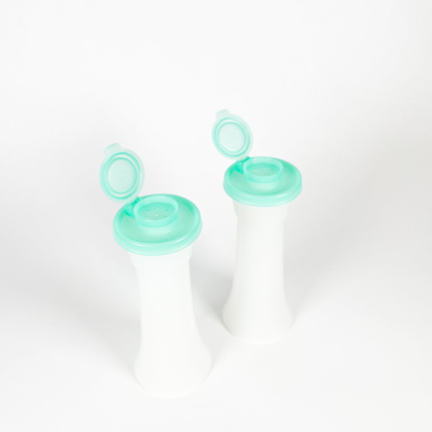 Tupperware turquoise salt and pepper shaker duo