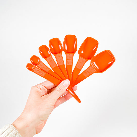 Orange Tupperware Measuring Spoons