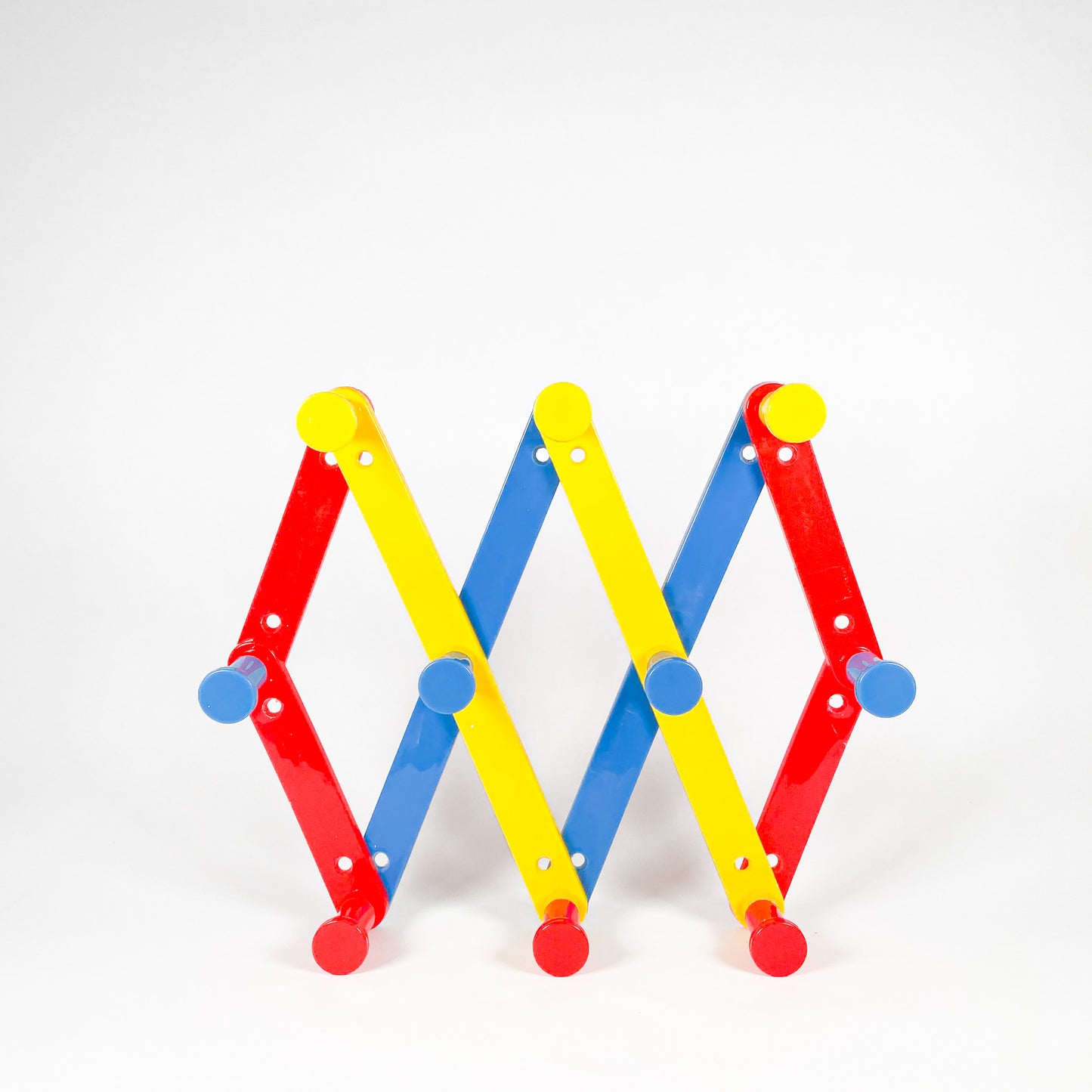 Primary colors plastic accordion rack