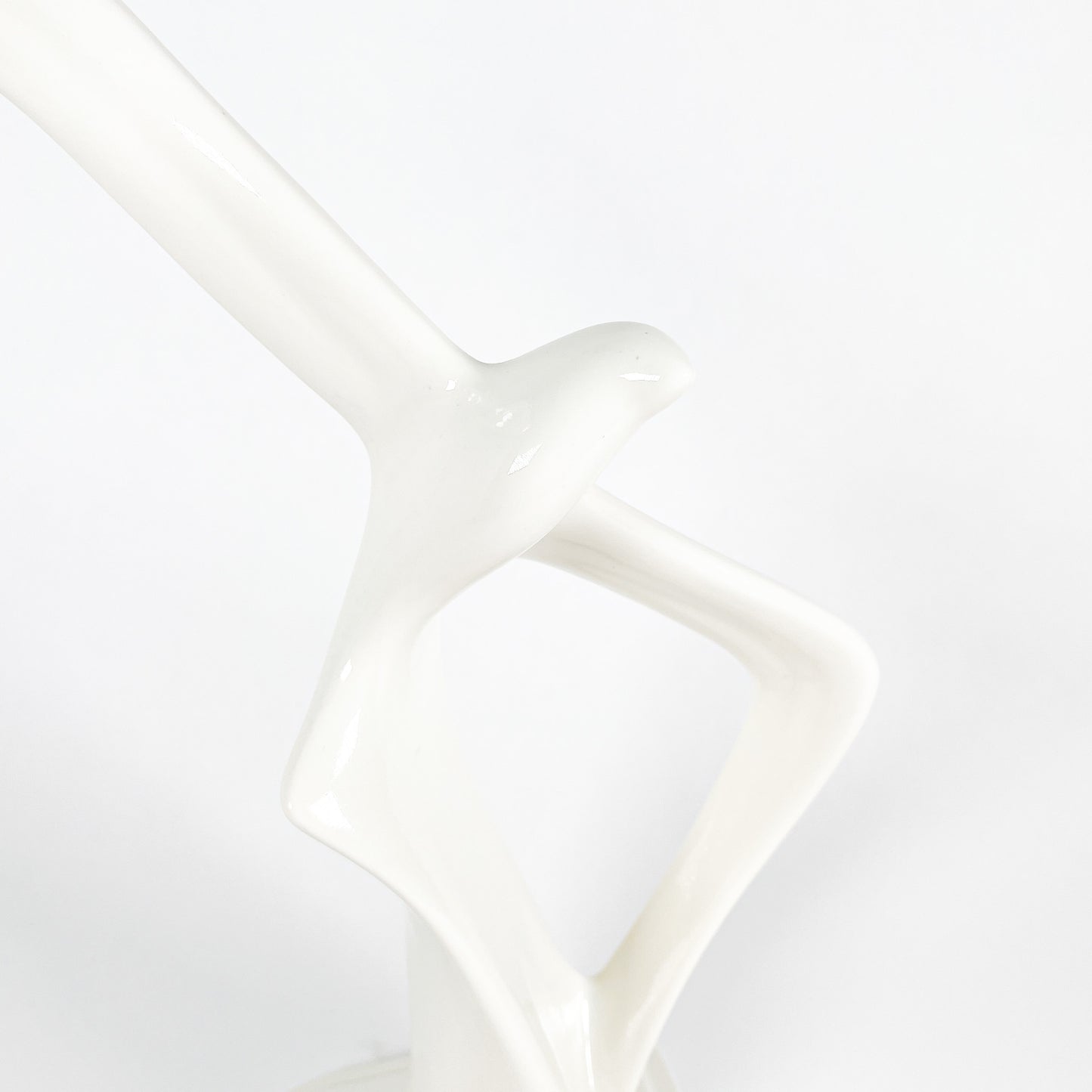White ceramic bird statue
