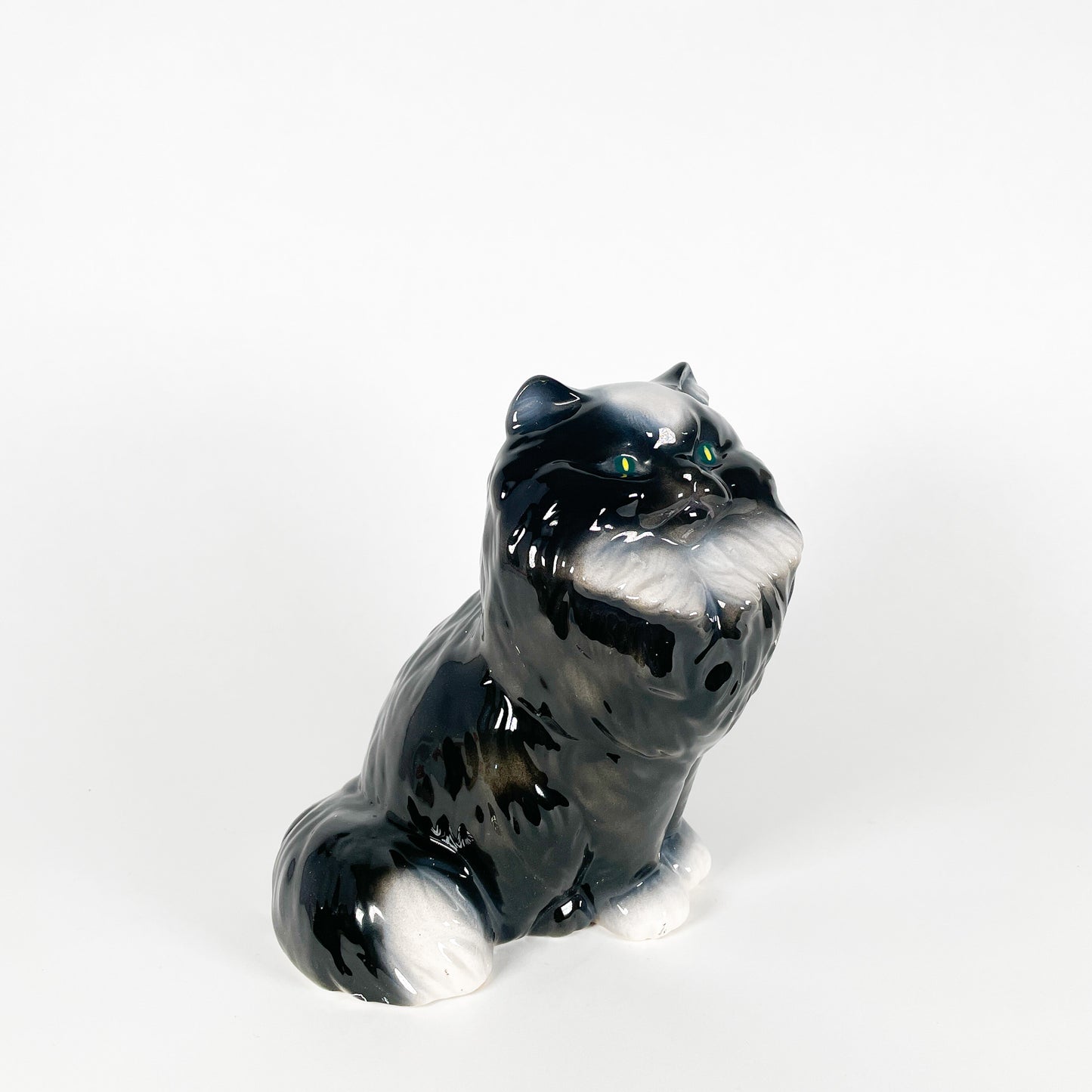 Black and white ceramic fluffy cat