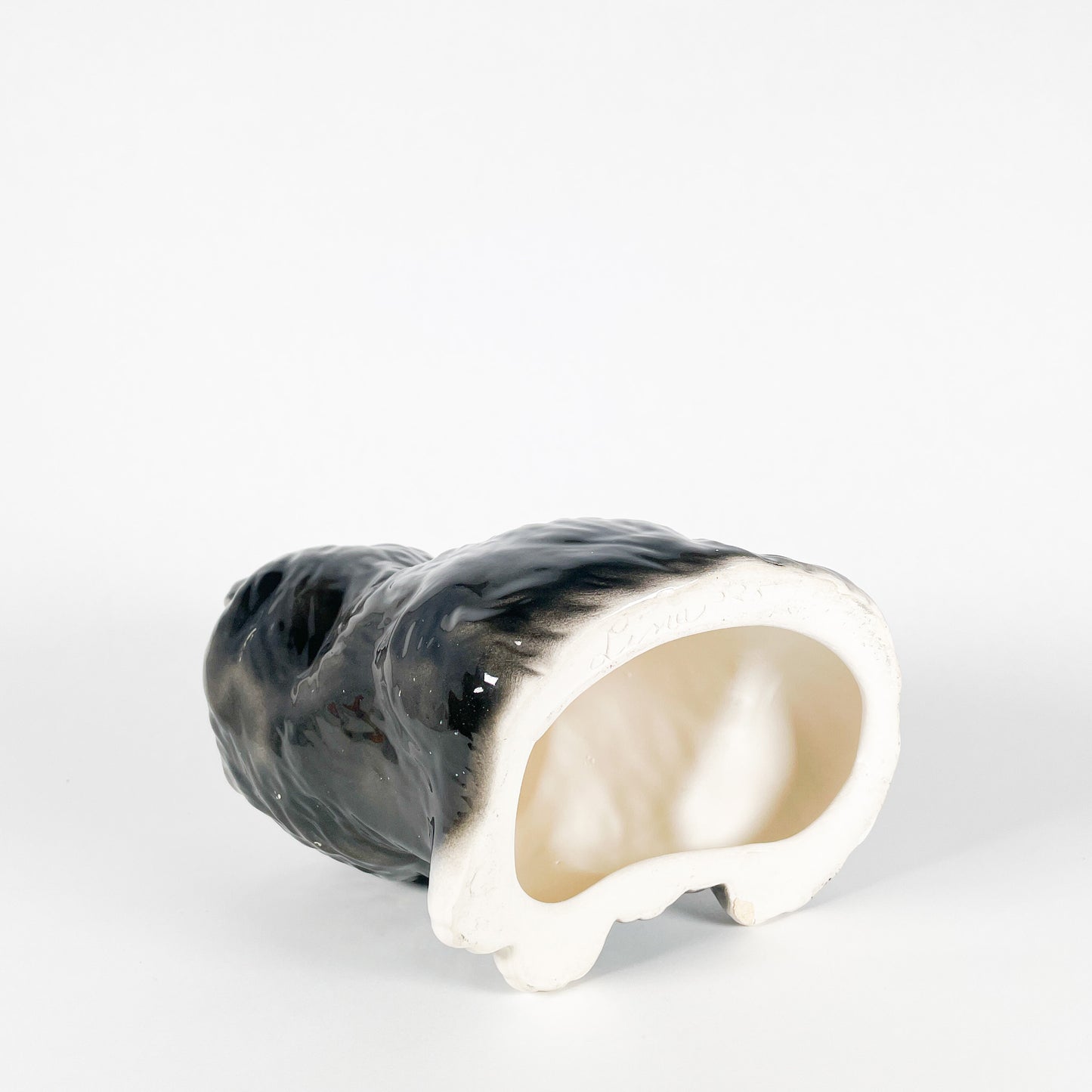 Black and white ceramic fluffy cat