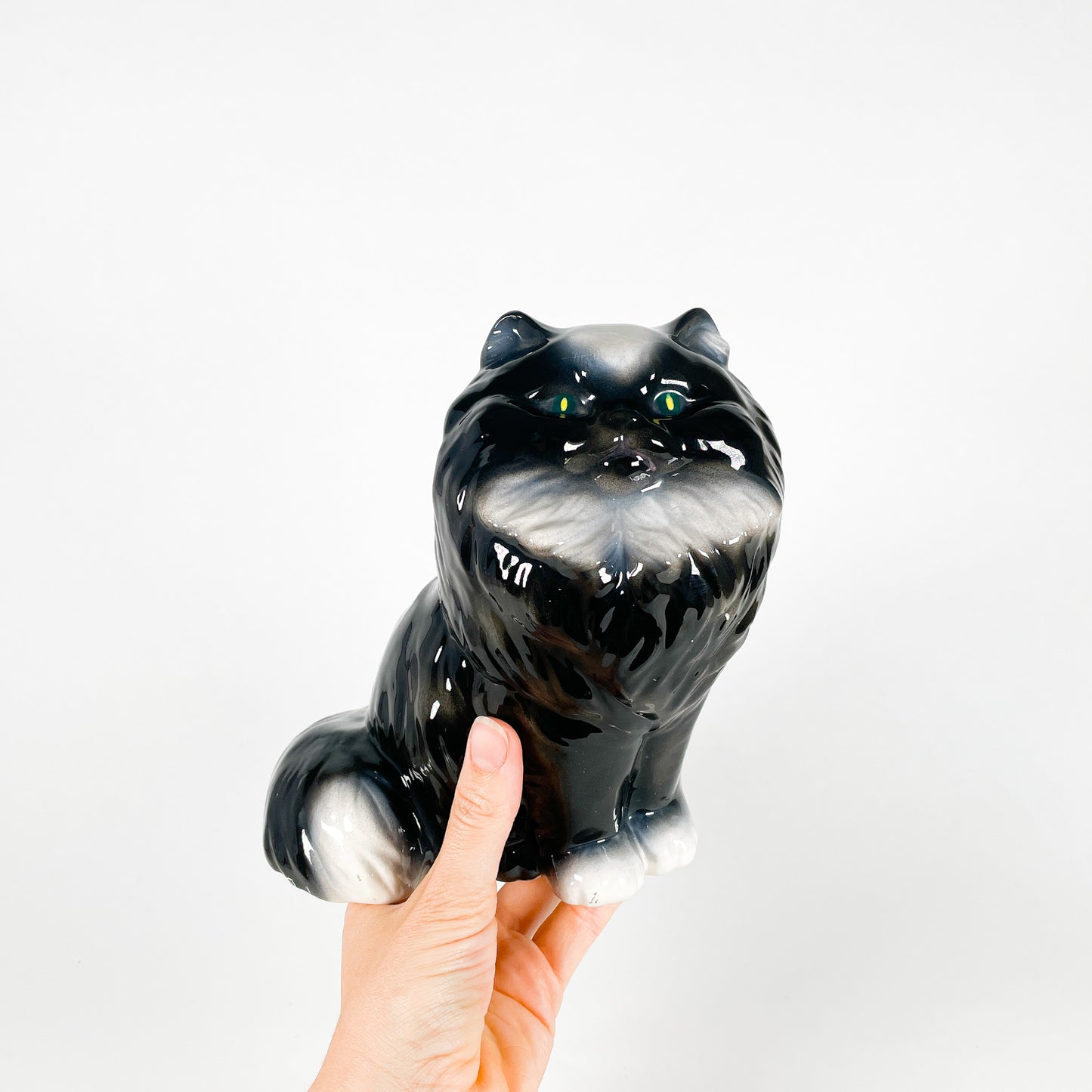 Black and white ceramic fluffy cat
