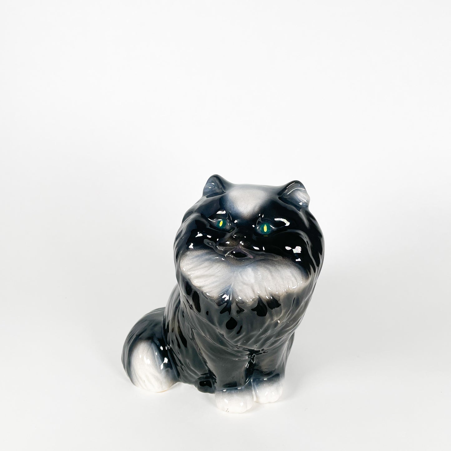 Black and white ceramic fluffy cat