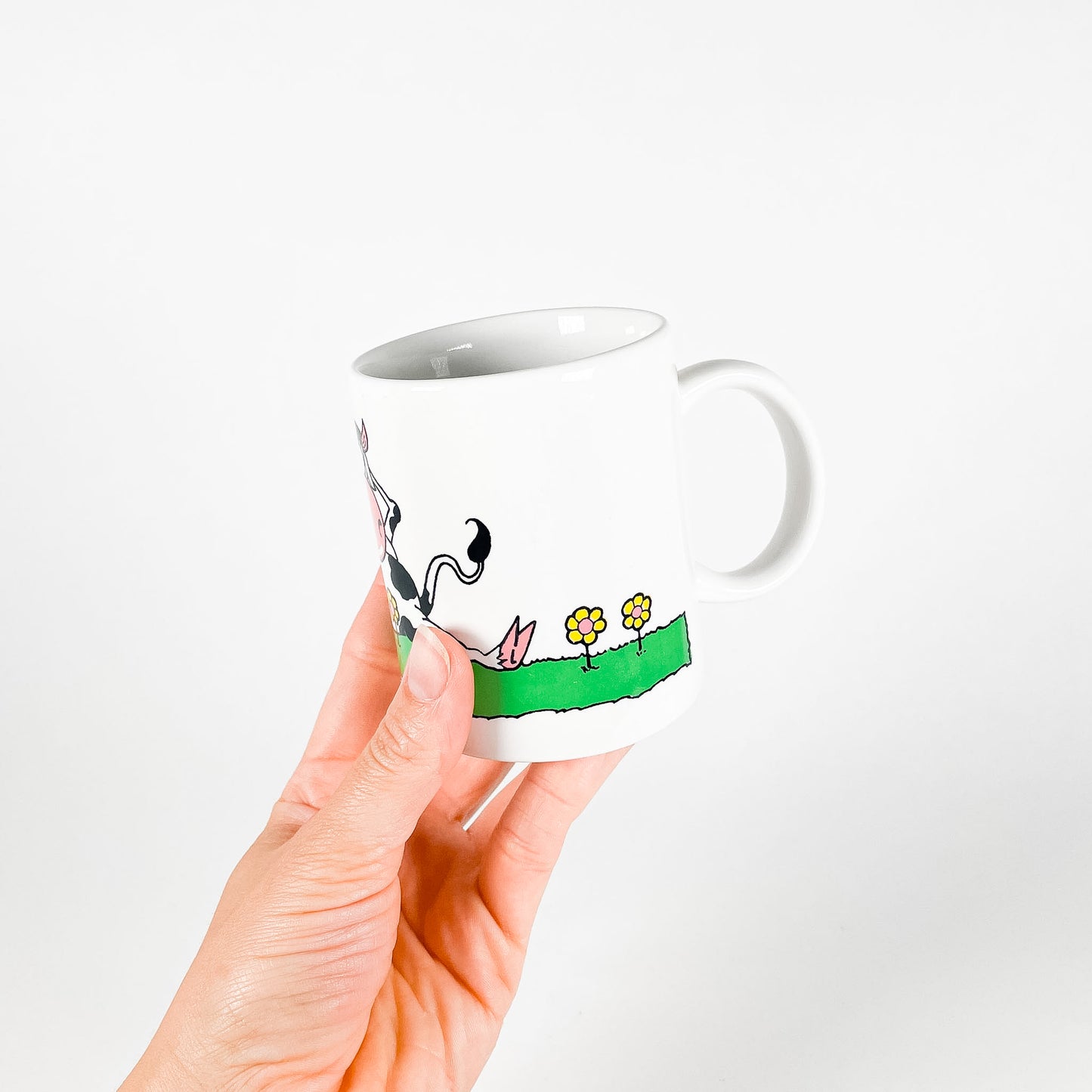 Cow in the meadow mug