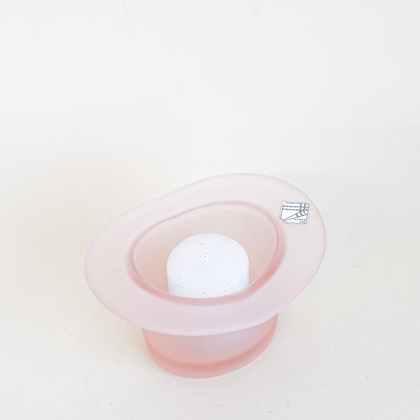 Pink glass hat candle holder