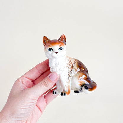 Little ceramic cats