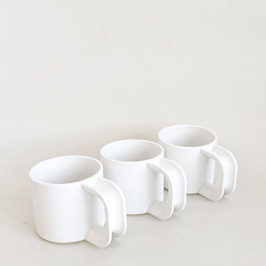 White plastic mugs trio