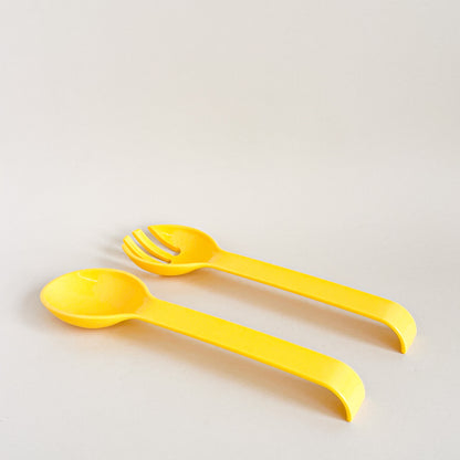 Yellow salad utensils