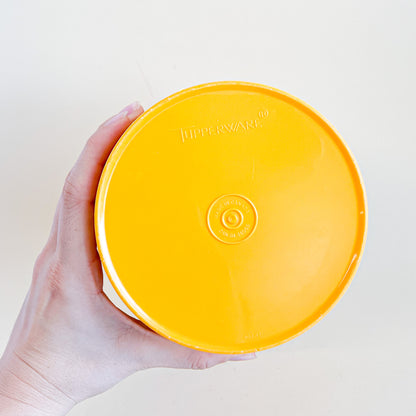 Mustard yellow Tupperware Servalier container