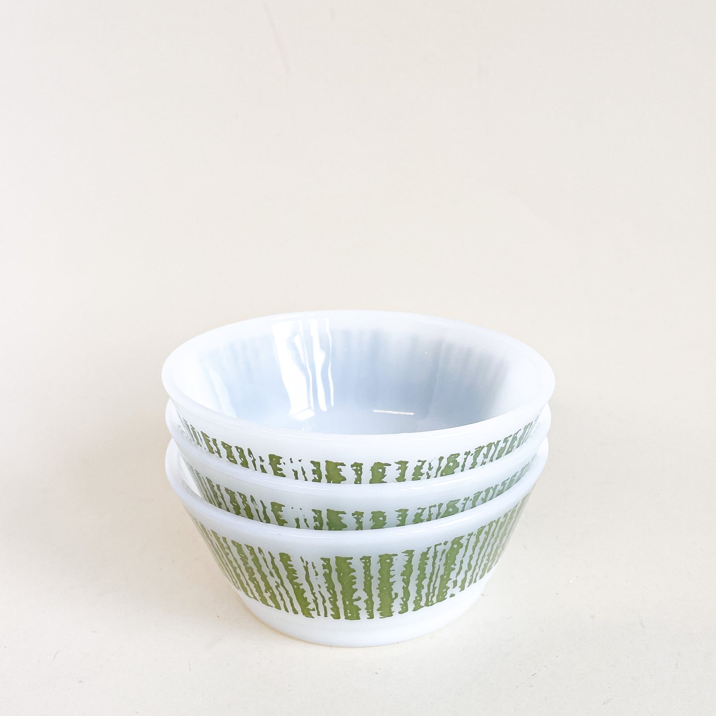 Trio of white and green Fire-King bowls