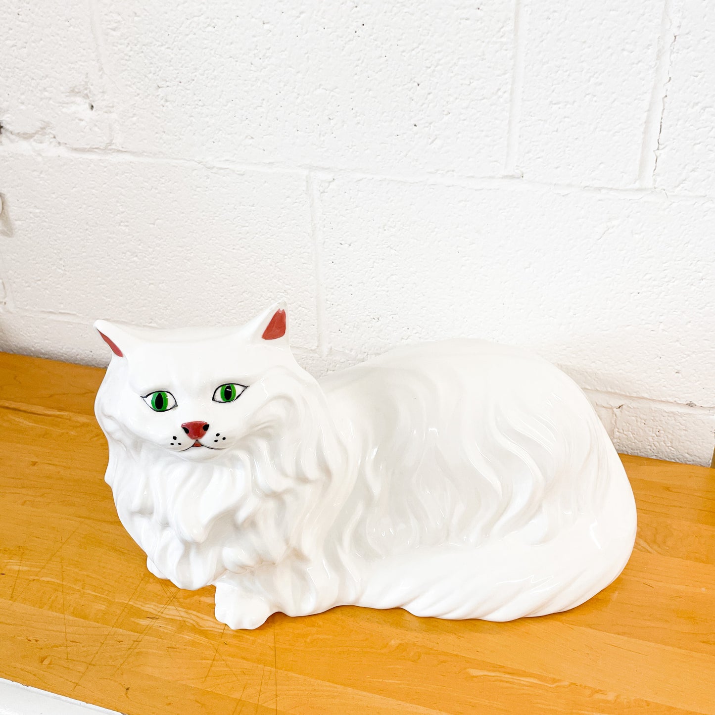 Large white ceramic cat