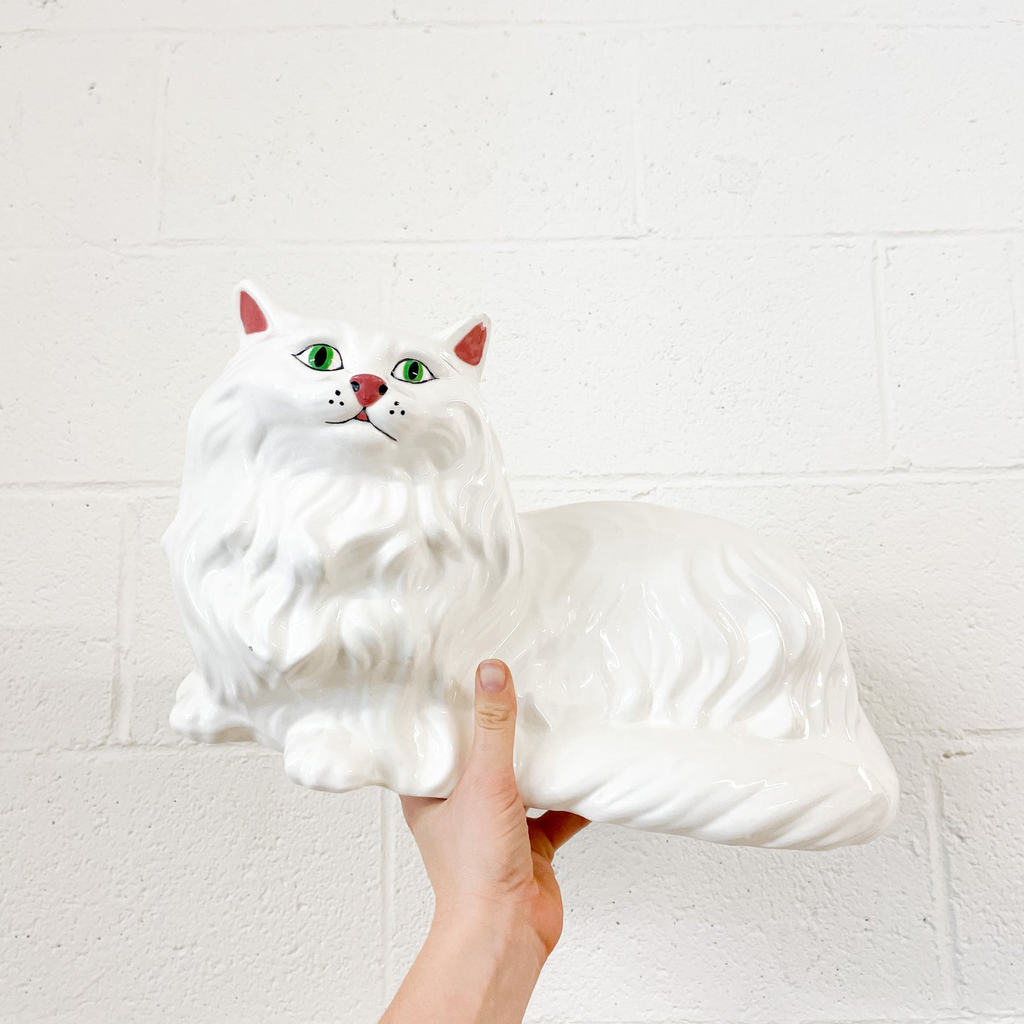 Large white ceramic cat