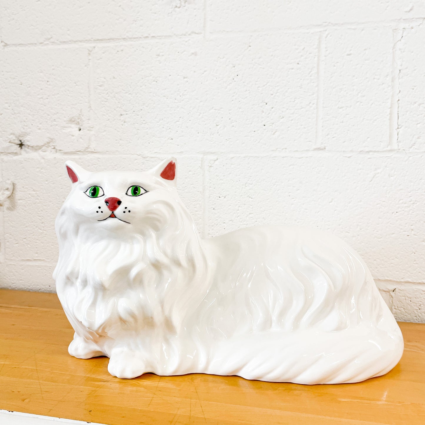 Large white ceramic cat