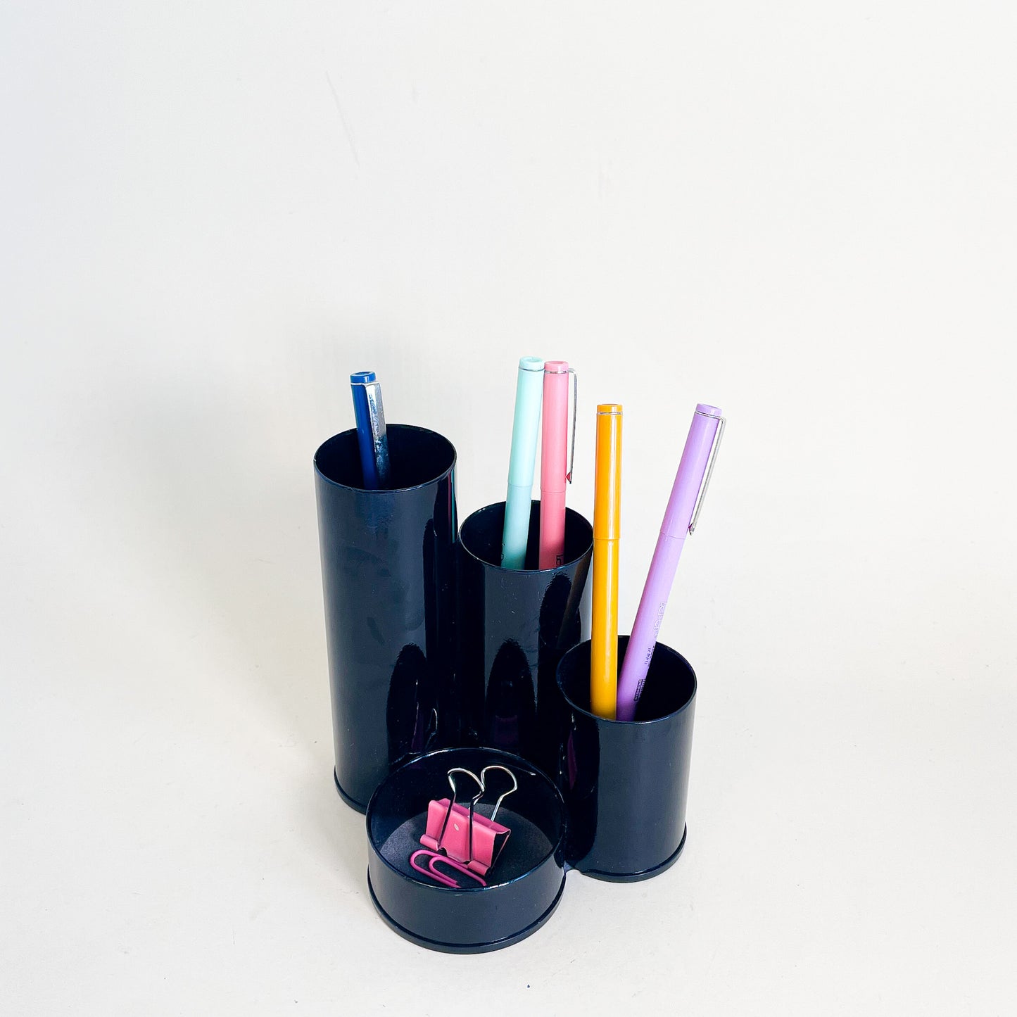 Black tubular pencil holder