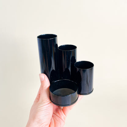 Black tubular pencil holder