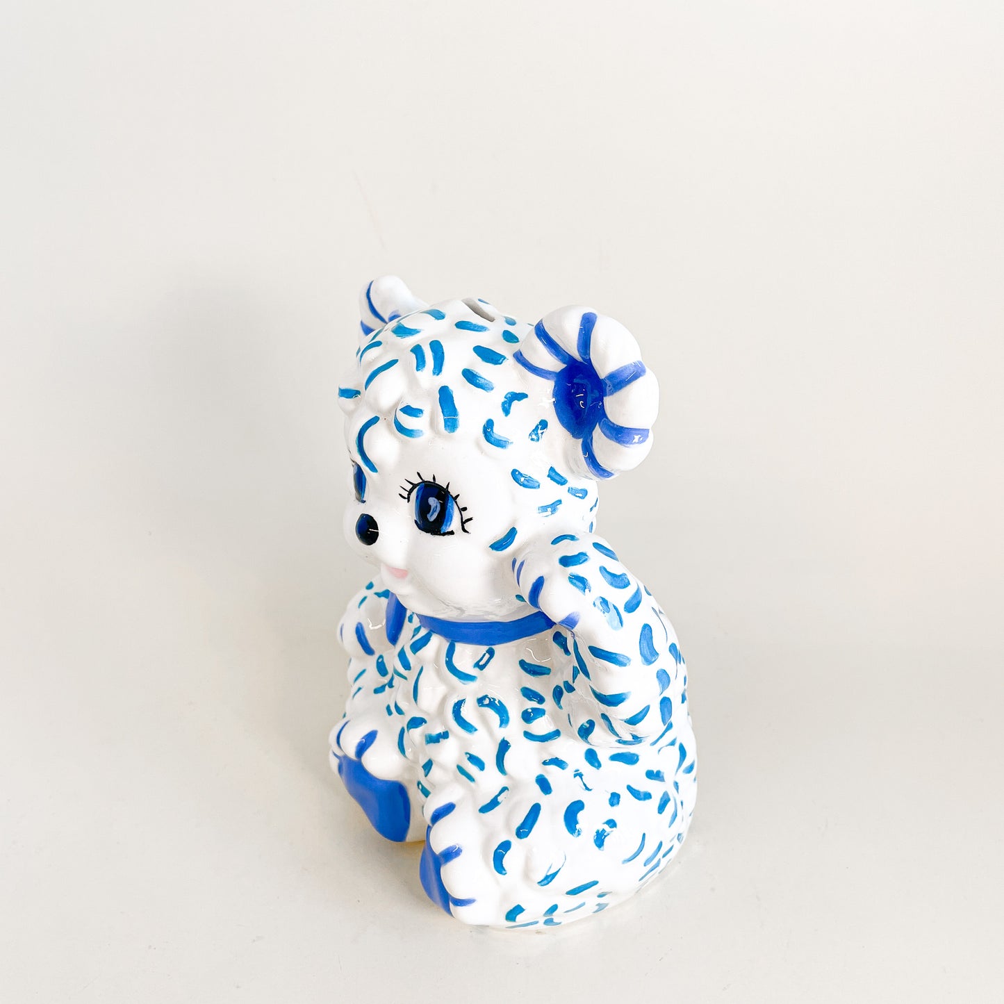 White and blue sheep piggy bank