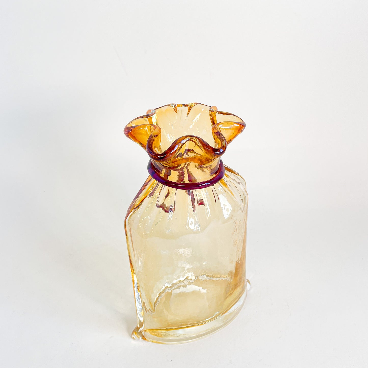 Amber blown glass bag/vase