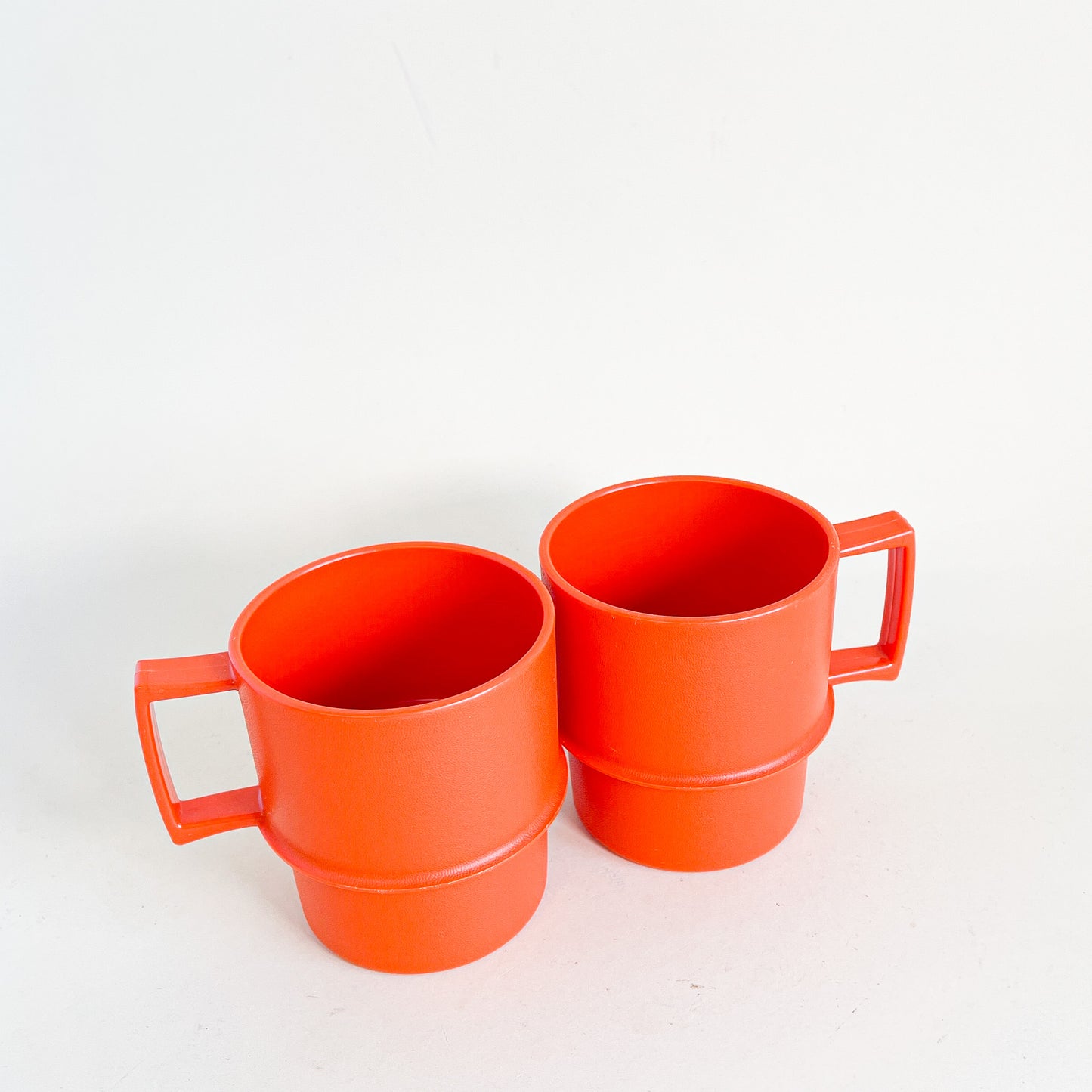 Orange Tupperware mug duo