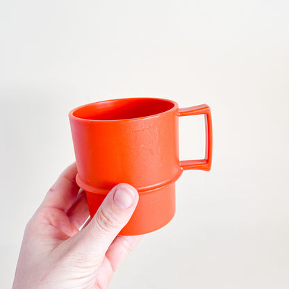 Orange Tupperware mug duo