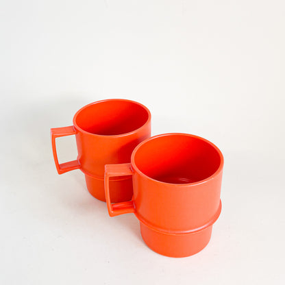 Orange Tupperware mug duo