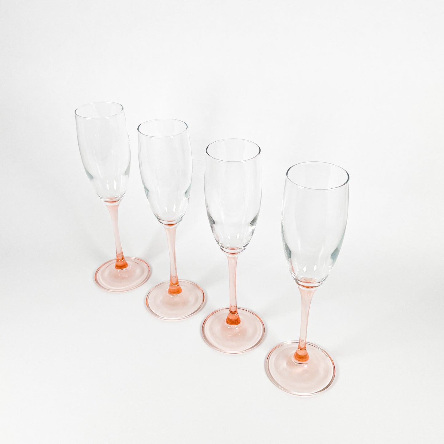 Pink champagne flutes duo