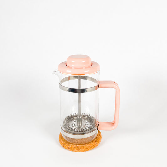 Small pink Bodum french press coffee maker