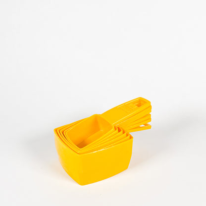 Yellow Frig-O-Seal measuring cups 