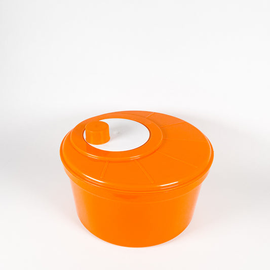 Orange plastic salad spinner