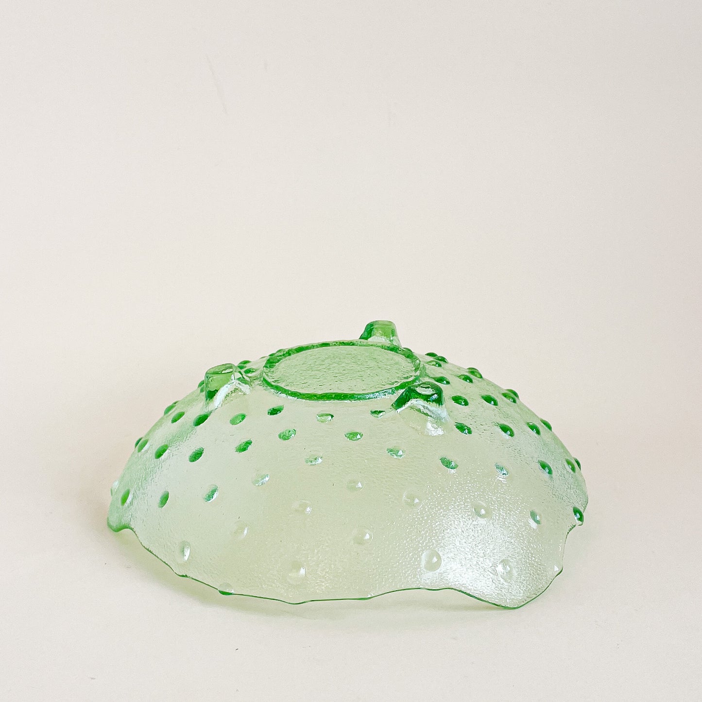 Green hobnail footed glass bowl