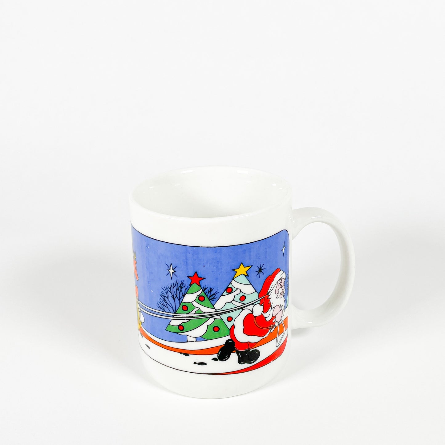 Tasse Père Noël qui tire son traineau