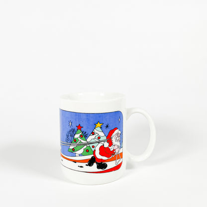 Tasse Père Noël qui tire son traineau