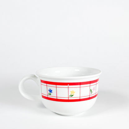 Red checkered mug with small flowers