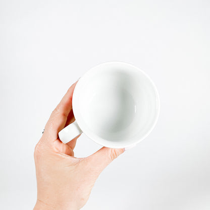 Red checkered mug with small flowers