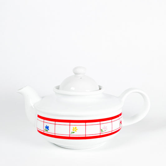 Red checkered teapot with small flowers