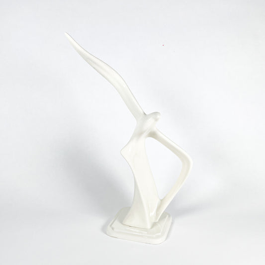 White ceramic bird statue