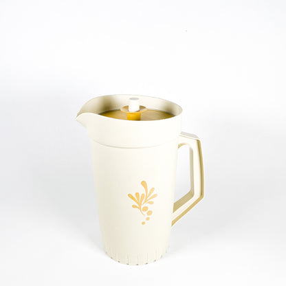 Beige Tupperware pitcher